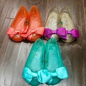 3 pairs of GAP jelly shoes.
